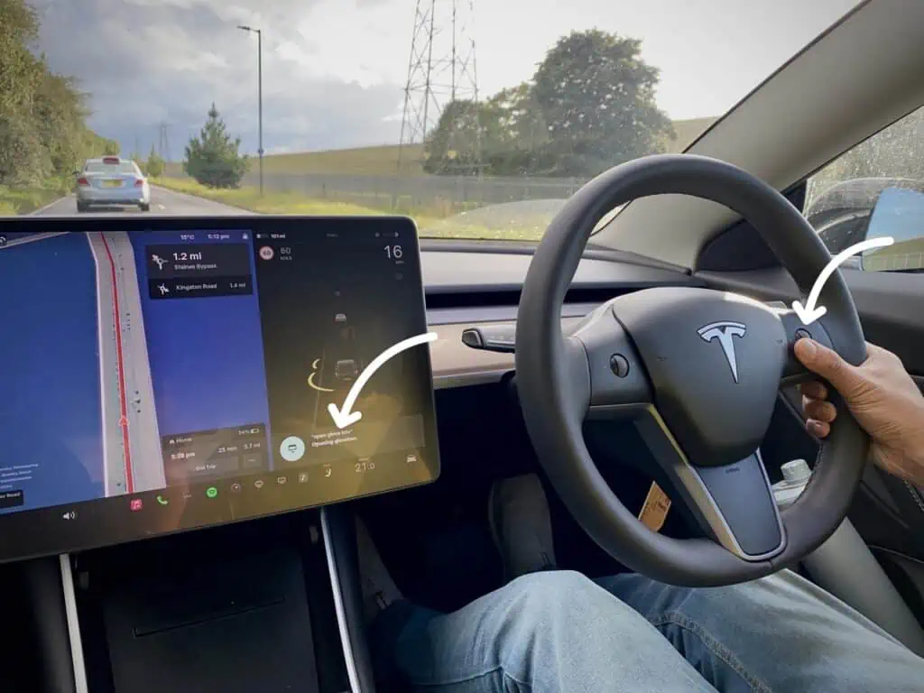 activating voice command on Tesla using the right scroll wheel on Tesla Model 3/Y